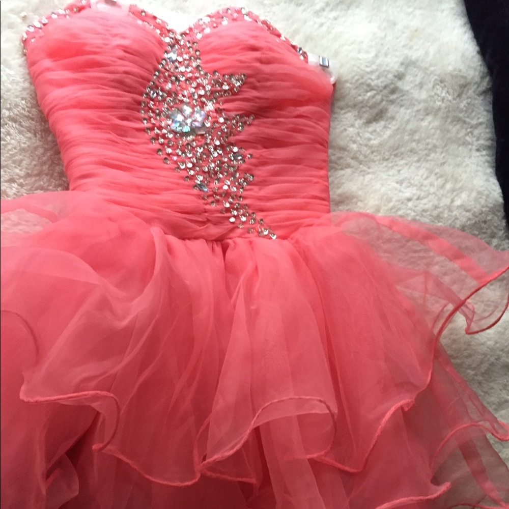 Size 2 Homecoming dress color Coral
